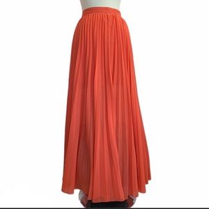 Bebe pleated long skirt -  Coral